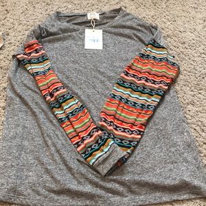 gray t-shirt with tribal sleeves